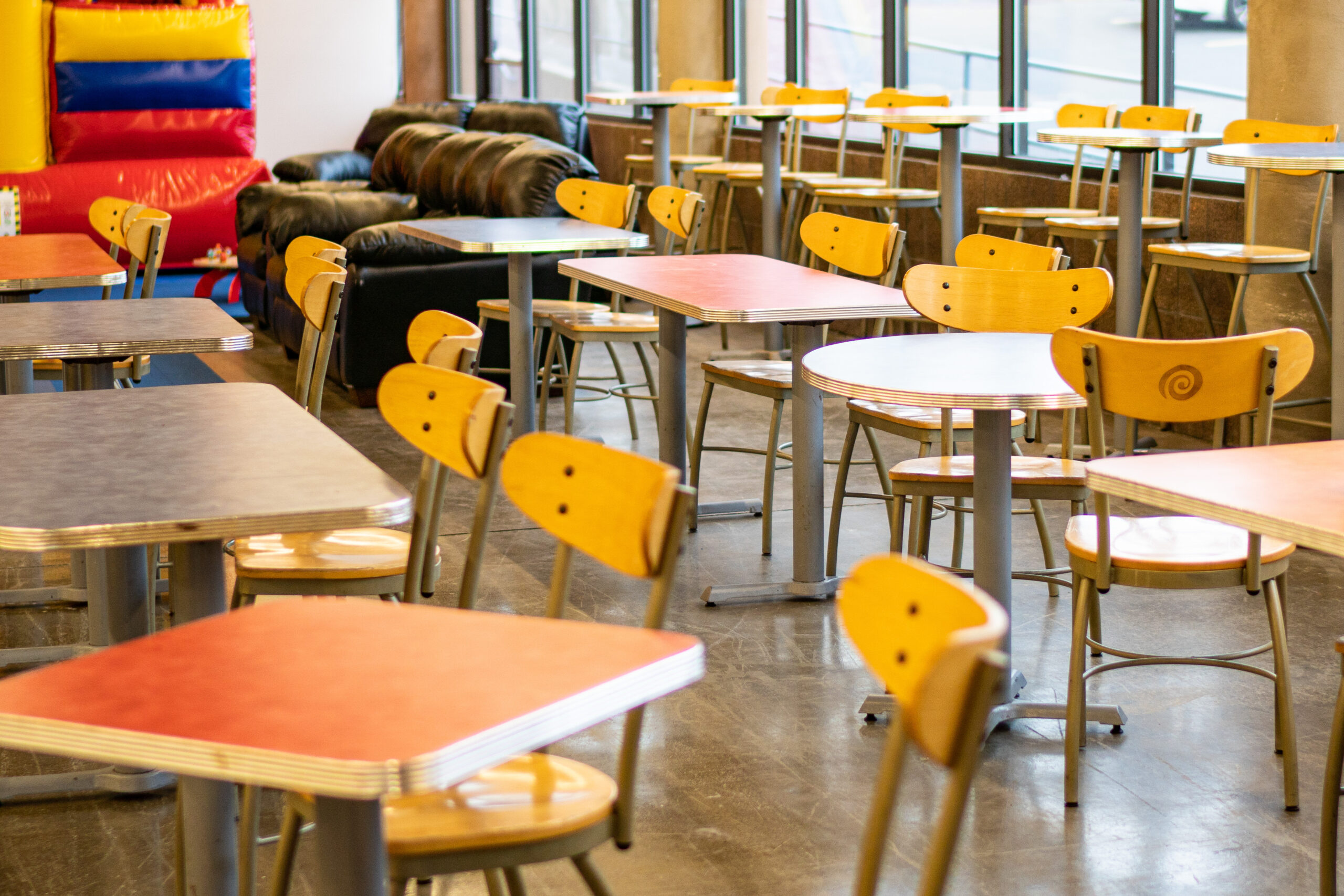 empty-chairs-tables-sidewalk-cafe